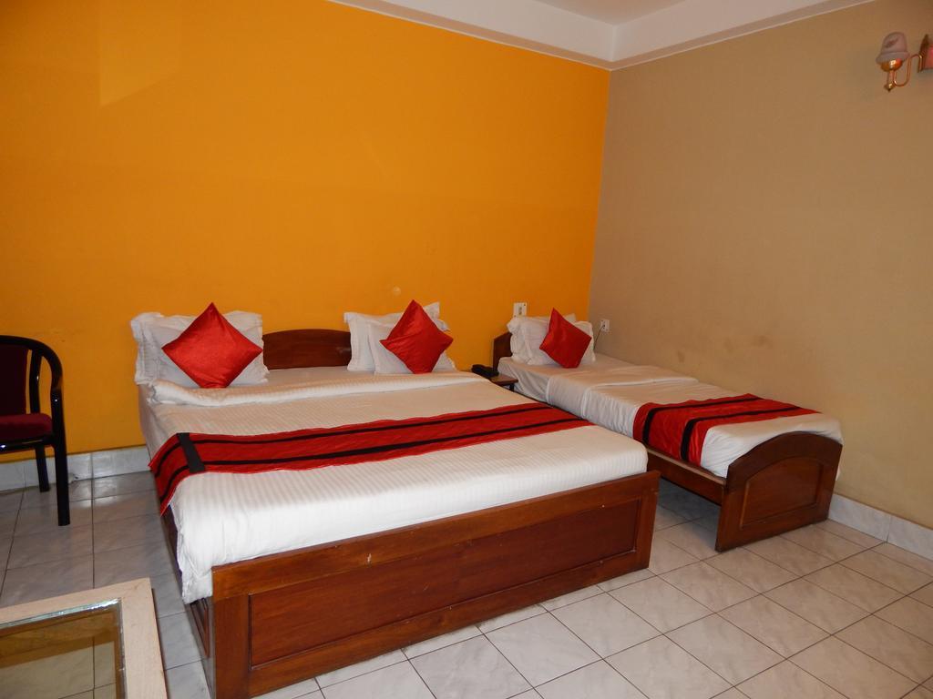 Breeze Hotel Сіліґурі Номер фото