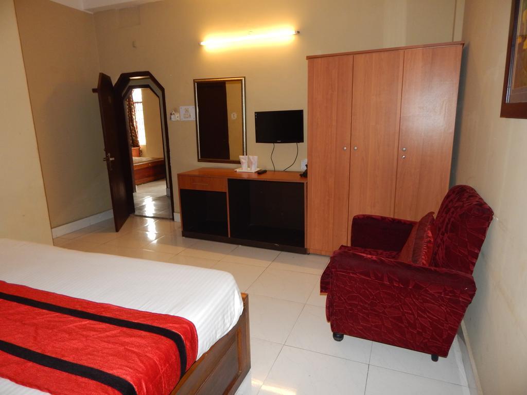 Breeze Hotel Сіліґурі Номер фото