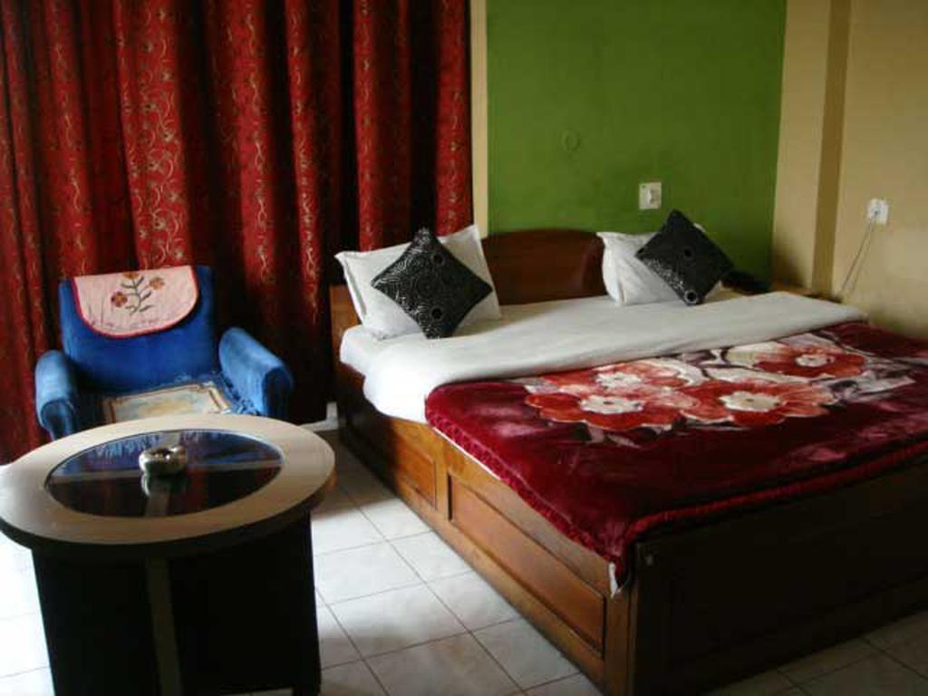 Breeze Hotel Сіліґурі Номер фото