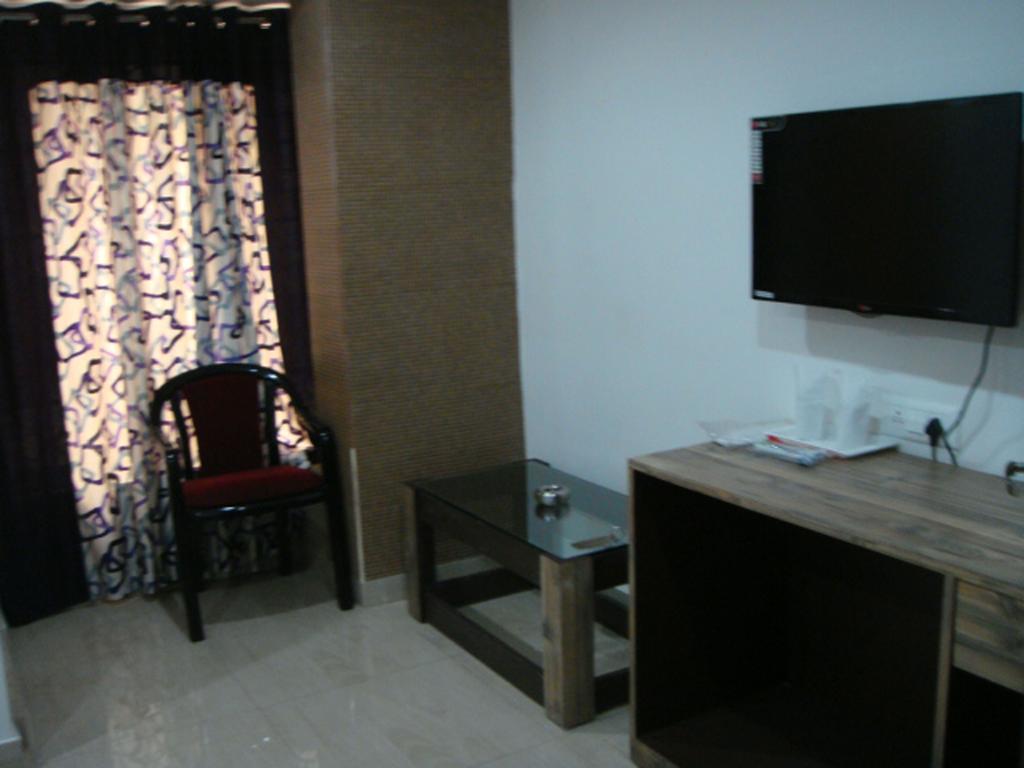 Breeze Hotel Сіліґурі Номер фото
